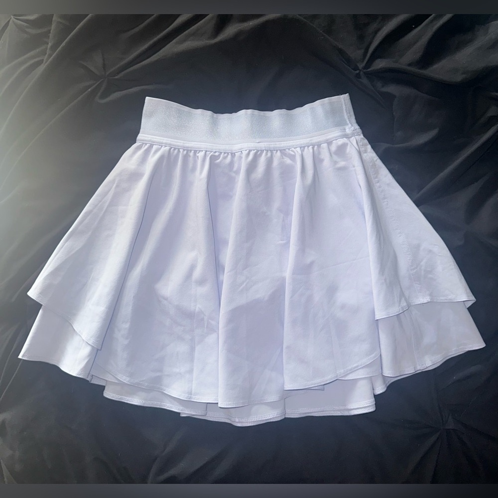 Lululemon Court Rival High Rise Skirt
(Shorts under the skirt have pockets)